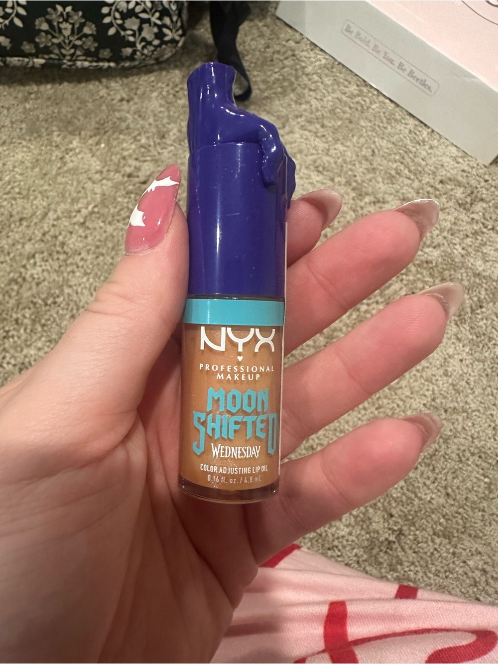 NYX Moon Shifted Color-Adjusting Lip Oil — Purple Cap, Tan Gloss